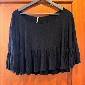 Black Ruffle Hem Women's Top cropped and flowy